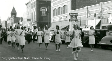 Historic photo of the MSU Parade in front of the Rocking 'R' Bar
